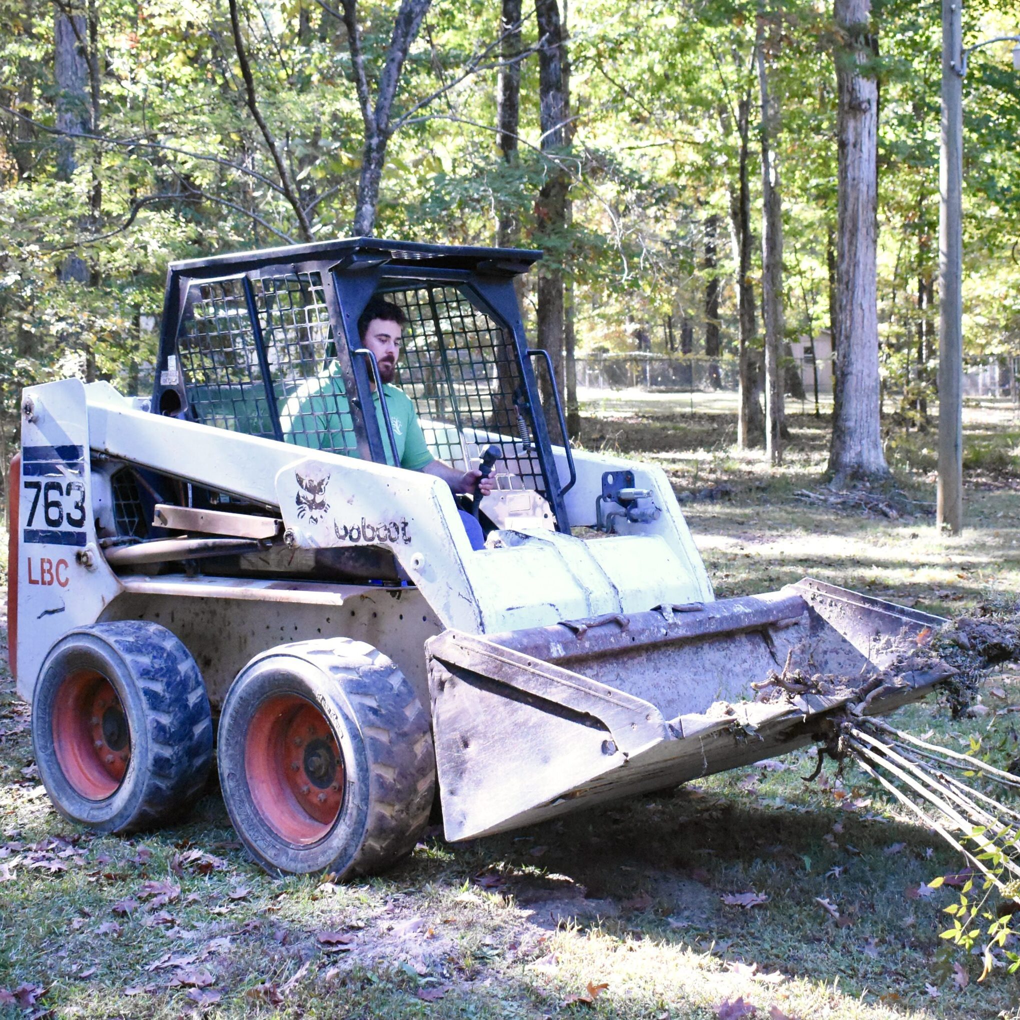 Skid steer service by JG Southern Landscaping LLC bobcat